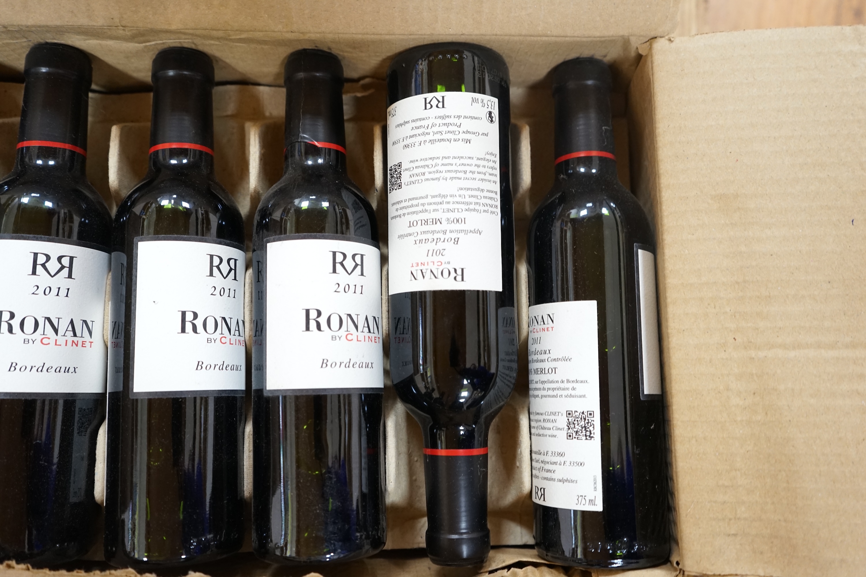 Twenty seven bottles (24 35cl and 3 75cl) of 2011 Ronan by Clinet Bordeaux wine. Condition - storage unknown